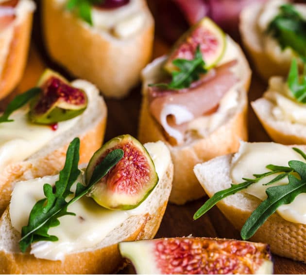 traditional-tapas-with-bruschetta-with-cheese-meat-and-figs-party-food-catering-platter